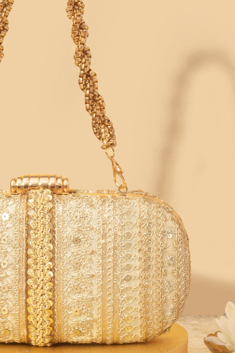 Naaz Embroidered Capsule Clutch - Gold