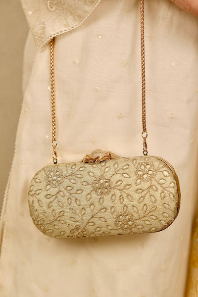 Tarang cutwork Capsule clutch - Light gold