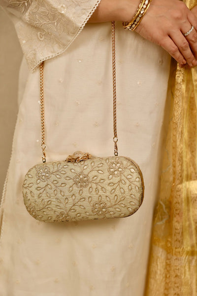 Tarang cutwork Capsule clutch - Light gold